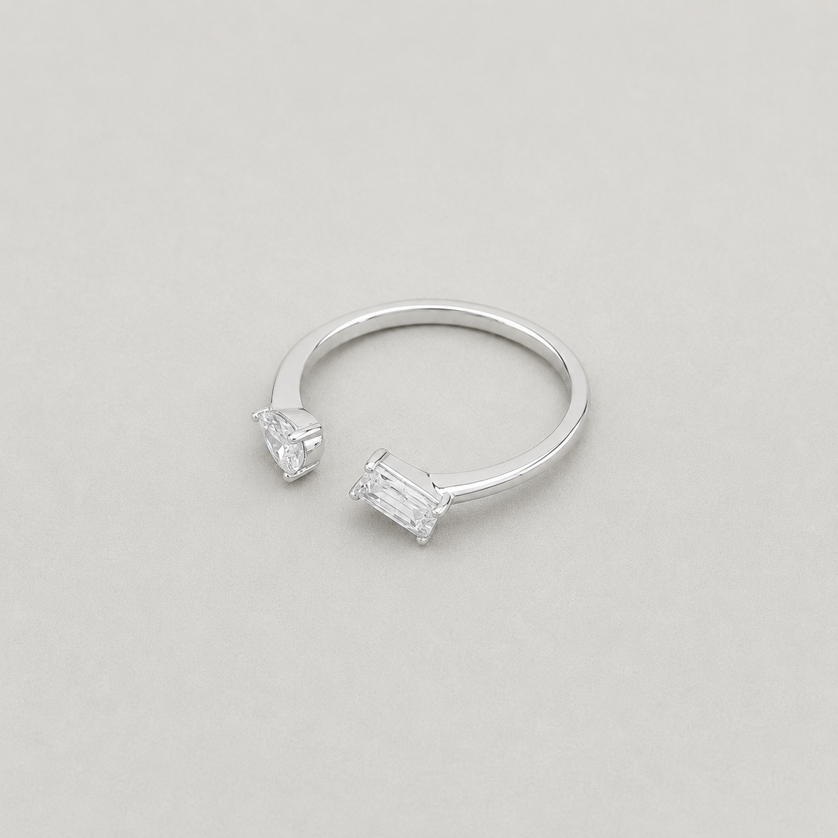 Pear and Emerald Cut Ring