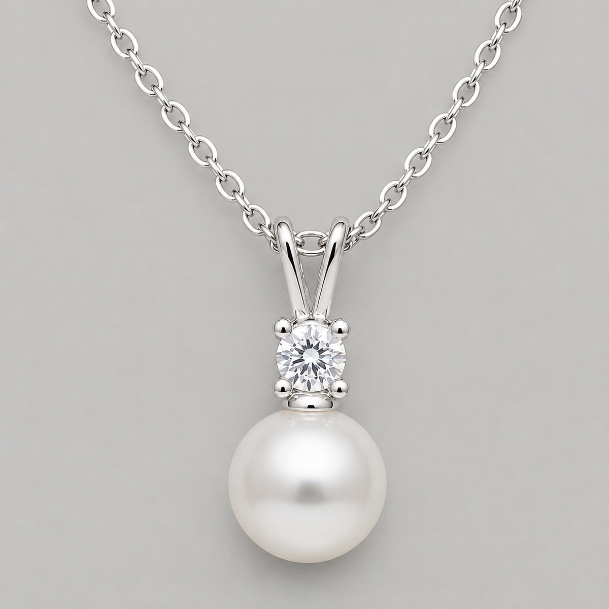 Modern Moissanite and Pearl Drop Pendant
