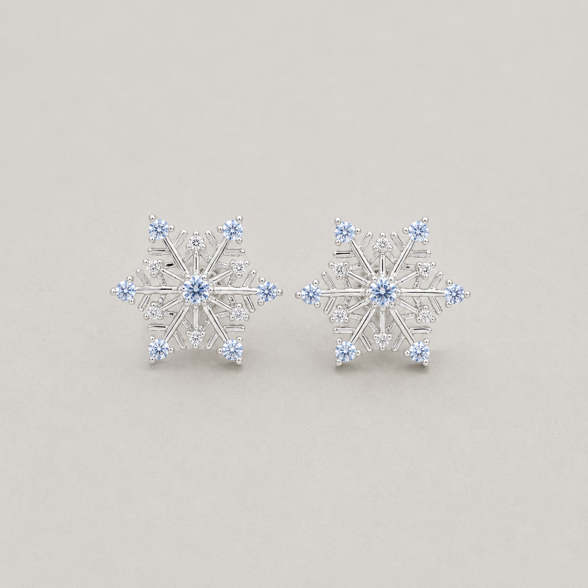 Snowflake Studs with Blue Accents