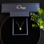 Elegant Crossed-Arch Silver Moissanite Pendant