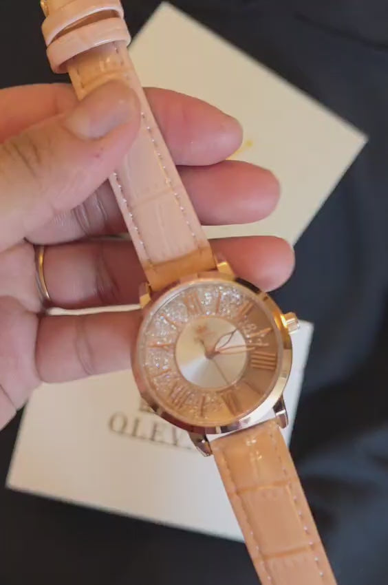 OLEVS 5539 Women’s Pink Skeleton Watch – Luxury Transparent Fashion Quartz Wristwatch (Waterproof)